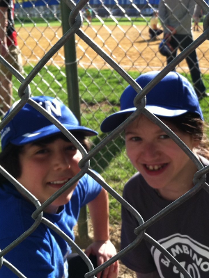 A picture from one of my favorite memories. I had the honor of teaming up with Ailish in Westfields Buddy Ball league, a program established by Babe Ruth Baseball for children with special needs.