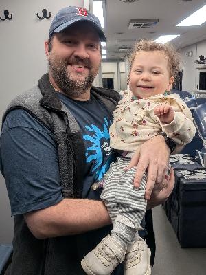 Olivia visiting Dan on the Bloodmobile