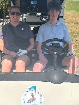 Cam and Tara golfing in the Caribbean