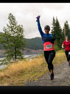 This is me, joyfully running a prior marathon!